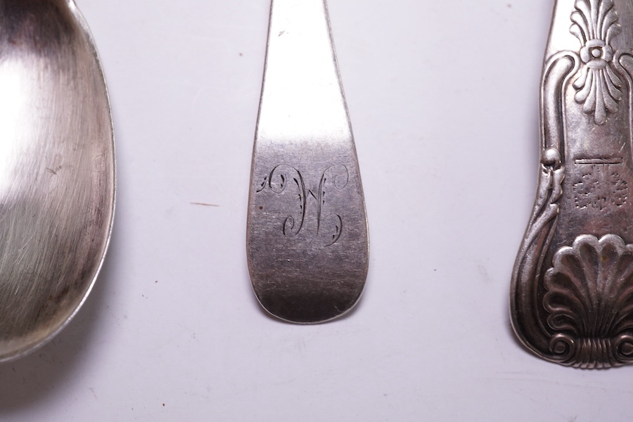 Five assorted 19th century Scottish silver condiment spoons, various dates and makers, a pair of George III silver sugar tongs, two other small silver spoons, 4.9oz and a silver plated preserve spoon. Condition - poor to